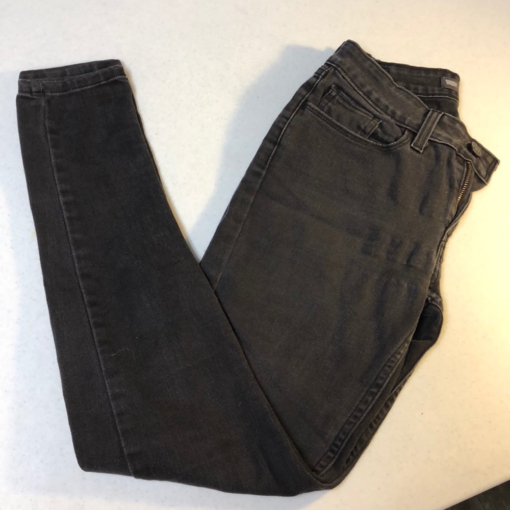 Levi’s distressed black “legging” fit jeans